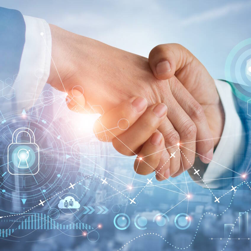 A handshake of business partners that share mutual growth