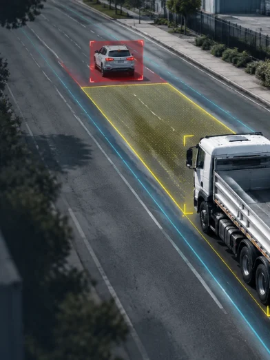 A truck with AI Detection Cameras highlighting pedestrians and vehicles ahead.